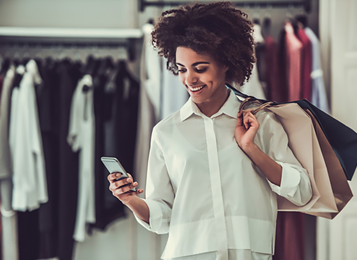 African American woman with a new Sprint unlock code for her handset.